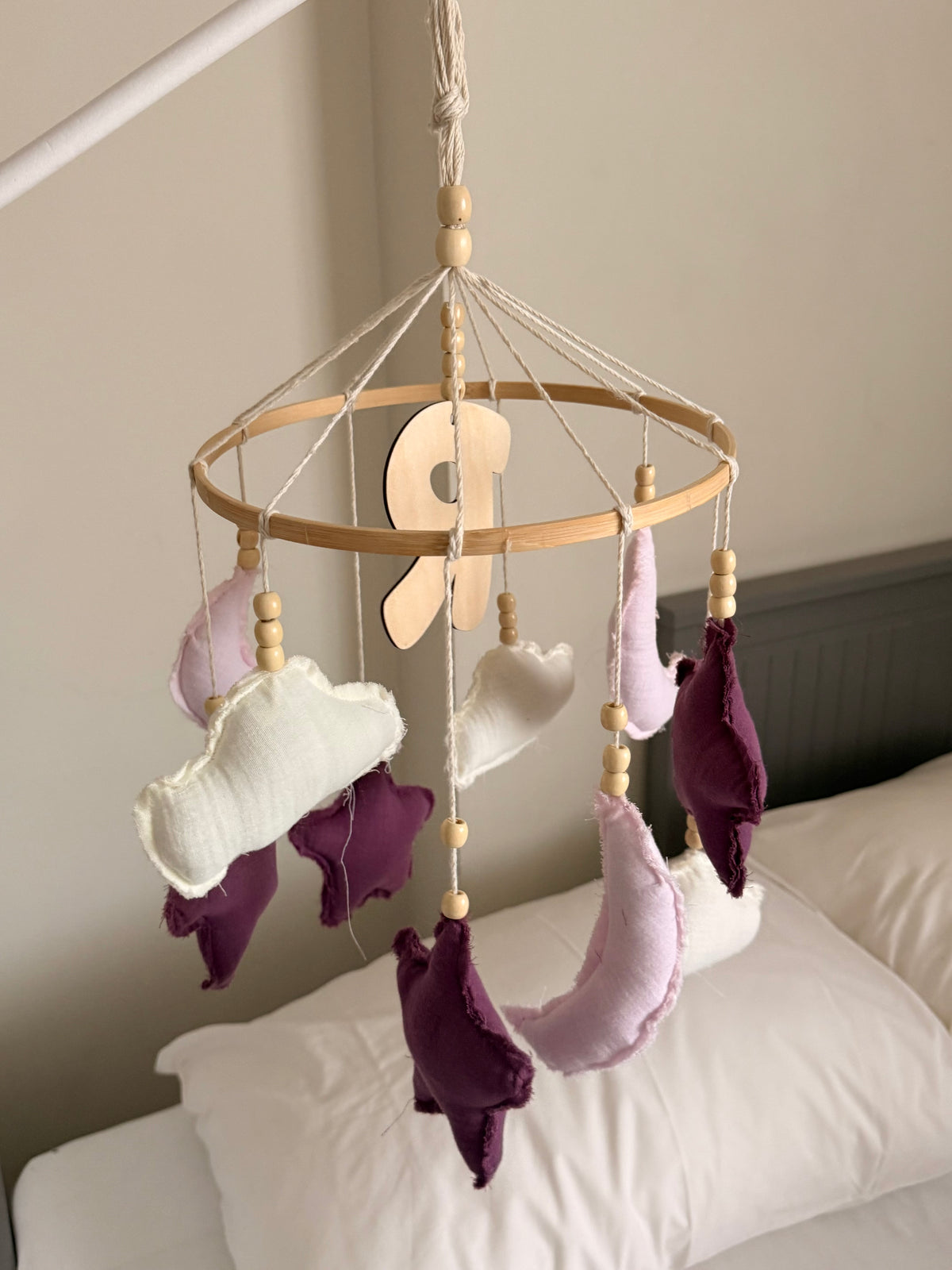 Personalized purple and pink fabric moon and clouds baby mobile with wooden beads and a custom wooden initial