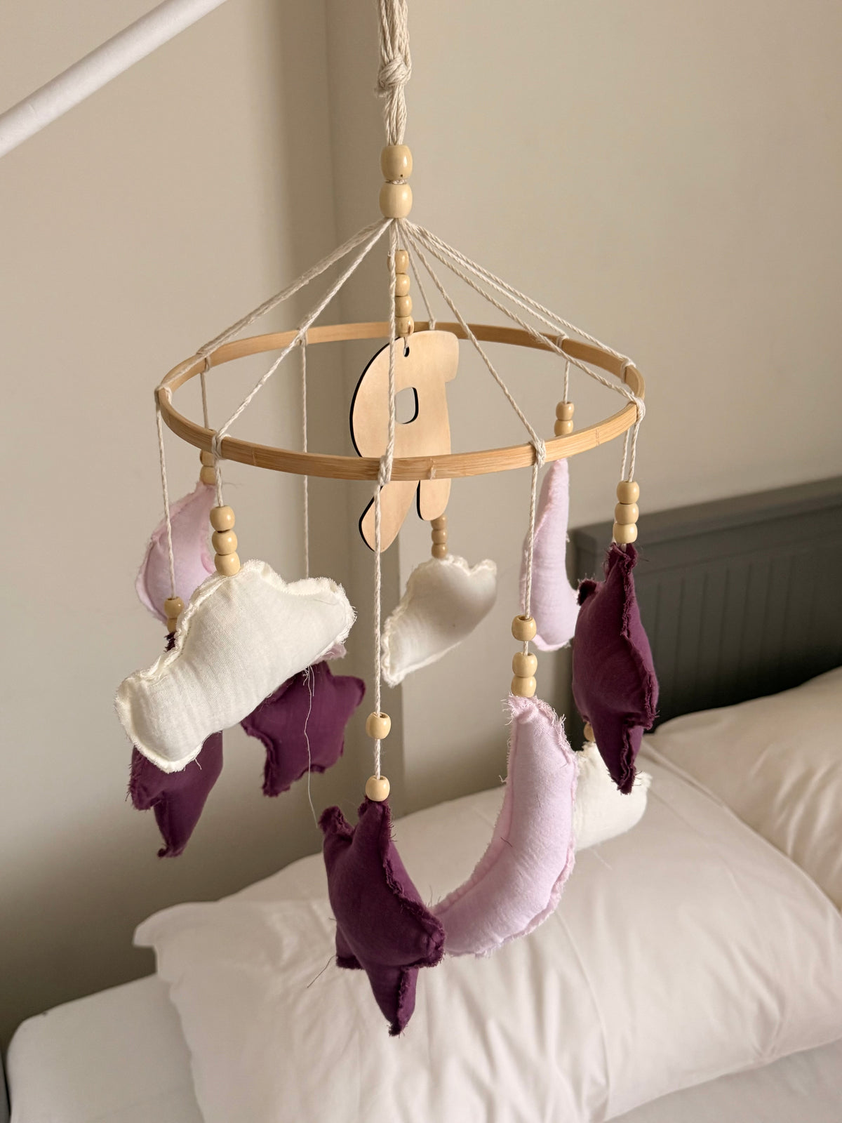 Purple, pink and white moon and clouds nursery mobile with fabric hanging shapes, wooden beads and a personalized initial