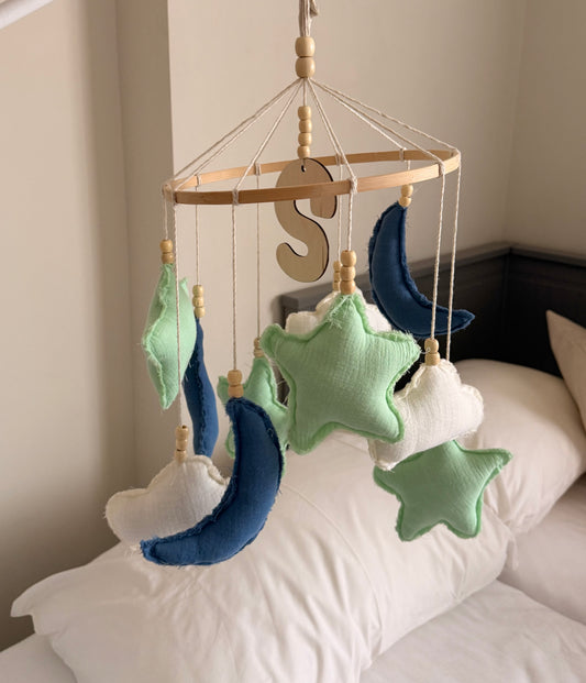 Blue, mint green and white fabric moon and stars baby mobile with natural wooden beads and a personalized wooden initial