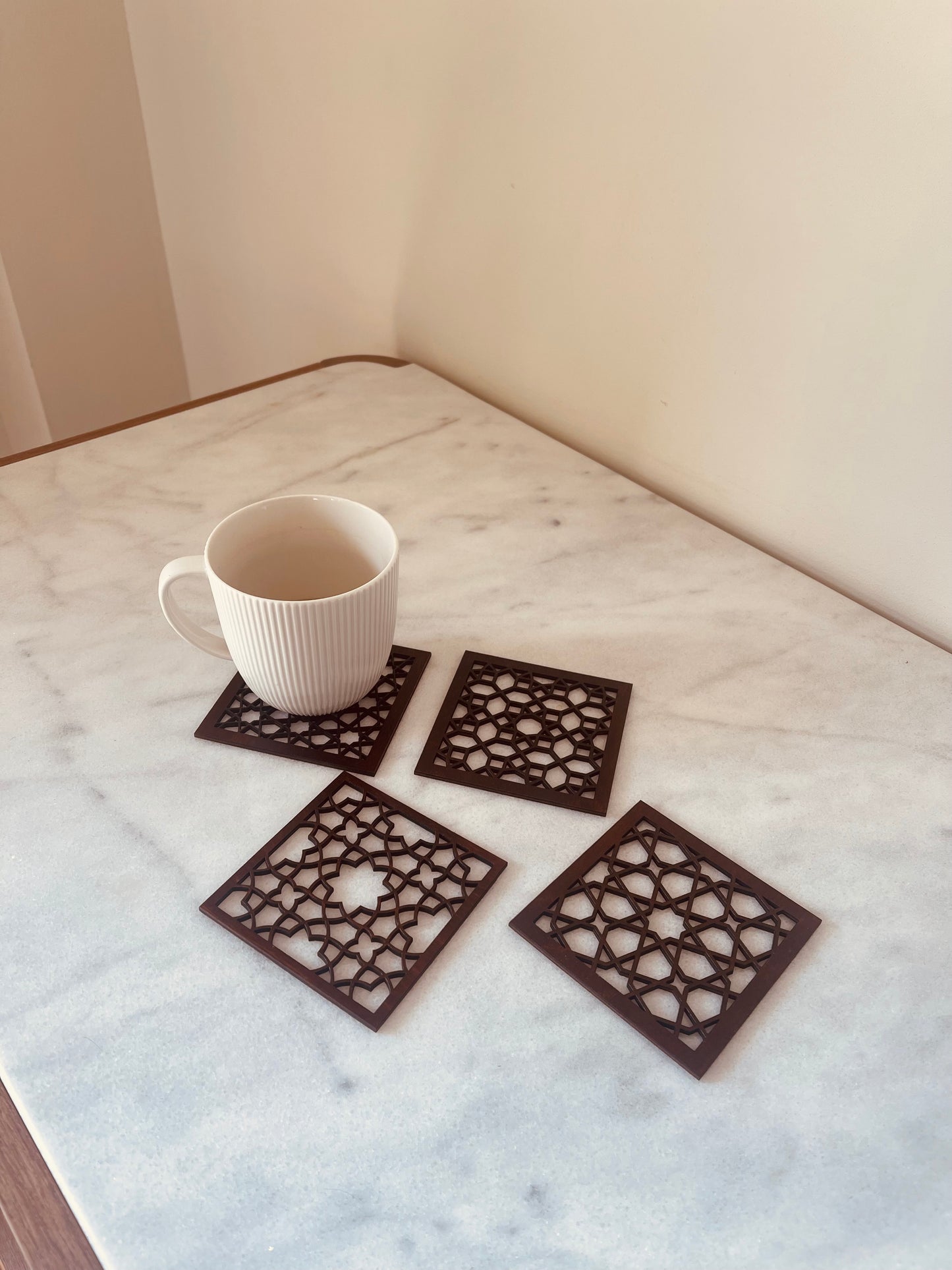 Wooden arabesque coasters set