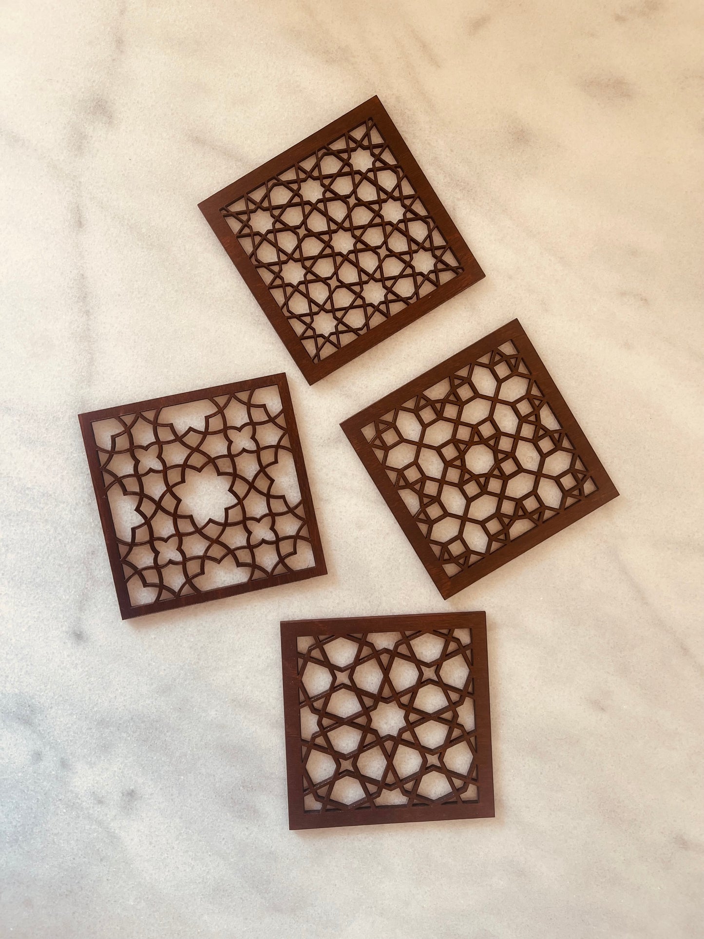 Wooden arabesque coasters set